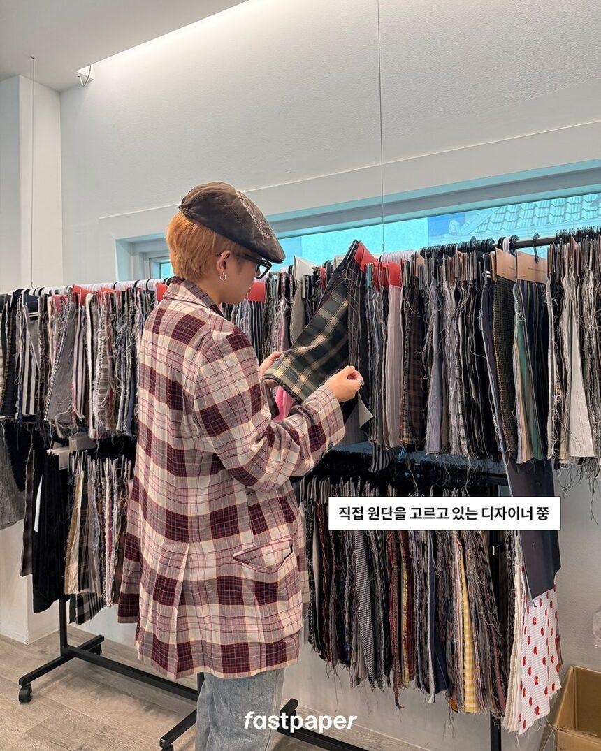"Designer Hongjoong personally selecting fabrics". - Credits to Fast Paper