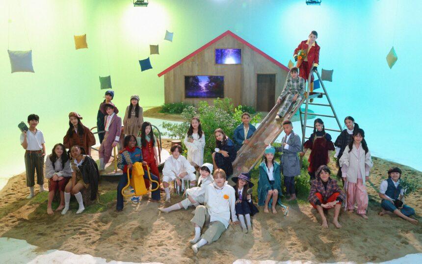 Hongjoong with all the models - Credits to Eyes Magazine